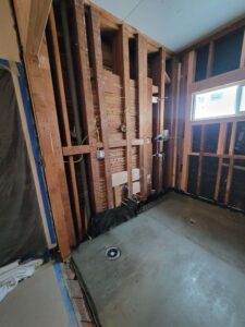 Early cable runs for for recessed lighting and outlets; new construction vinyl window installation and framing